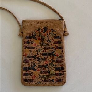Gorgeous and unique cork purse from Portugal. Measures 8" x 5". NWOT.